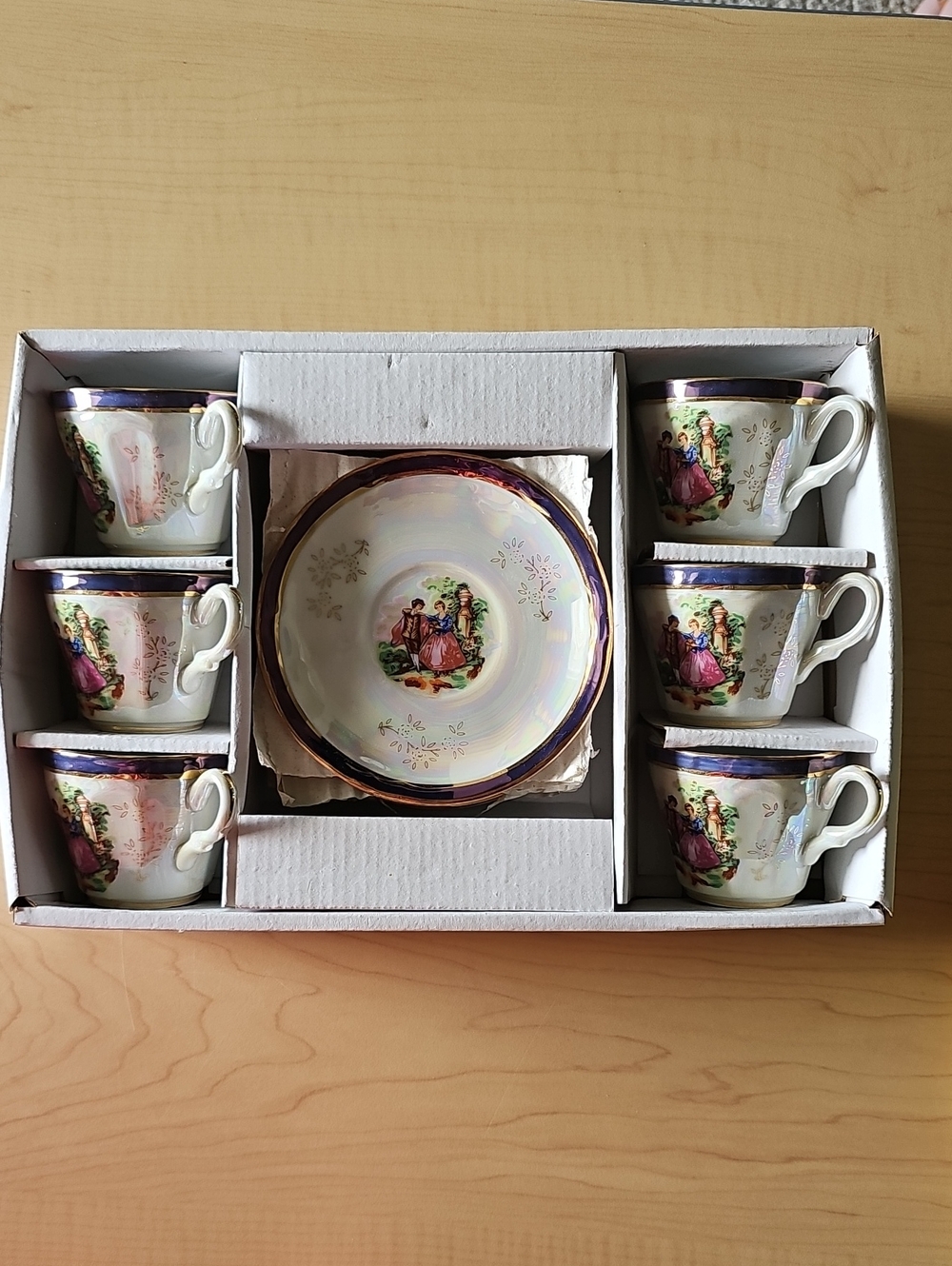Porcelain Tea Cup and Saucer Set in Cream with Purple and Gold Trim